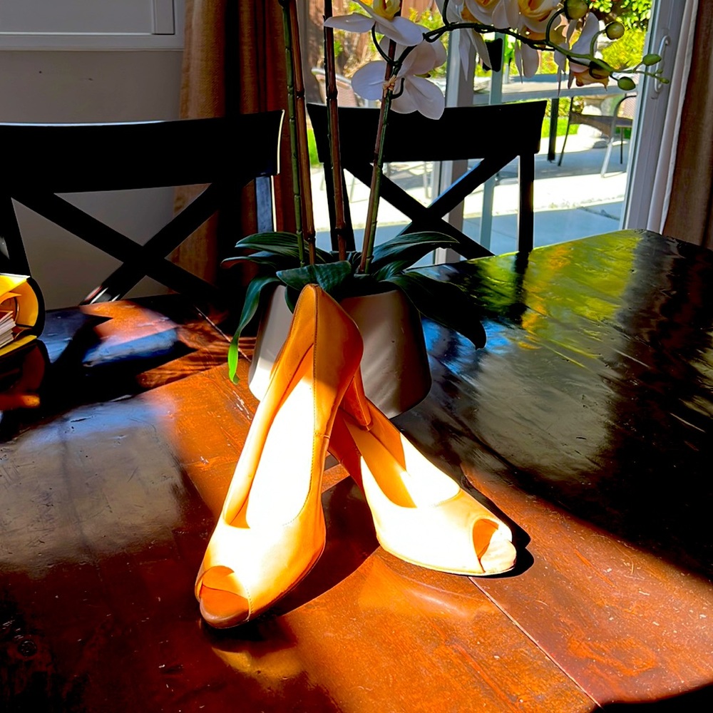 Cole Haan peep-toe pumps in natural colored leather. In pristine condition.